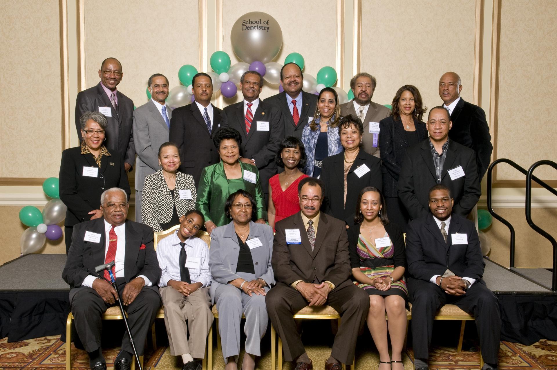 A group of the First 100 Dentists of color pose for a photo.